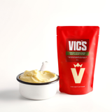 Red Vics package with a bowl of creamy potato mash on a white background
