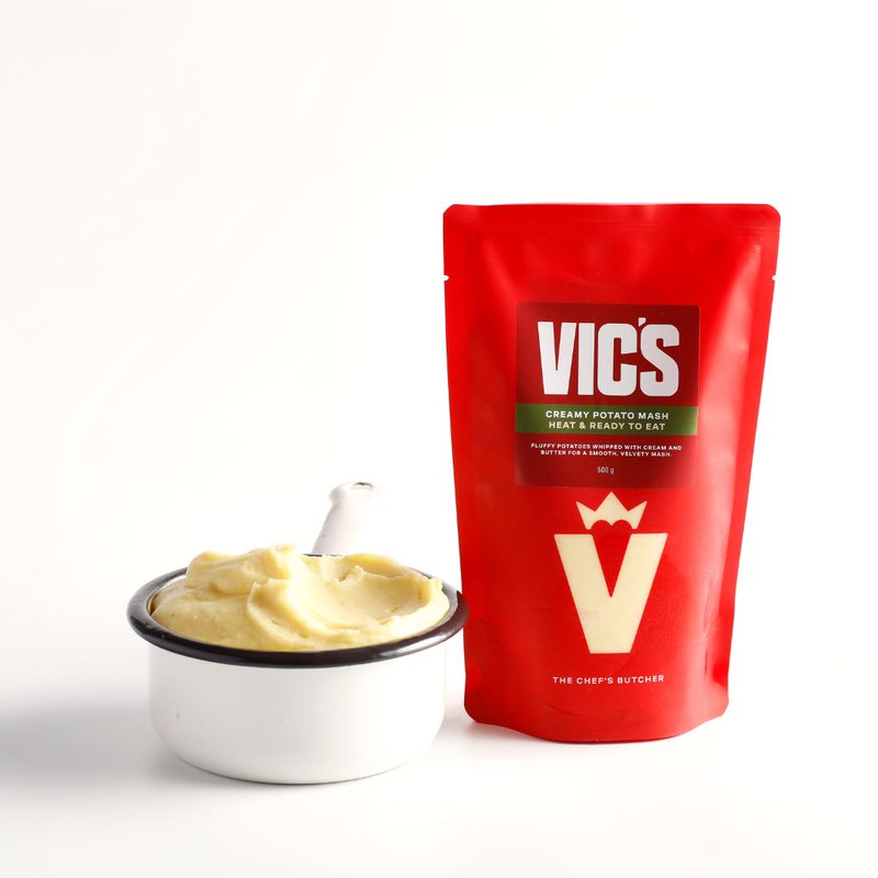 Red Vics package with a bowl of creamy potato mash on a white background