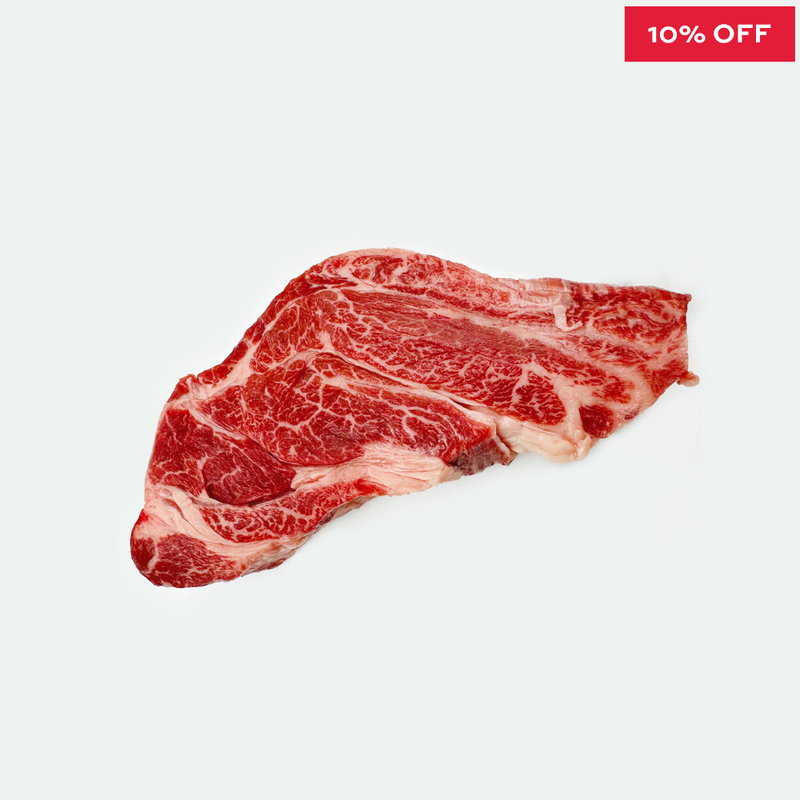 A single raw marbled meat cut, likely beef, shown on a plain light background with a red promotional badge in the top-right corner reading '10% OFF'.